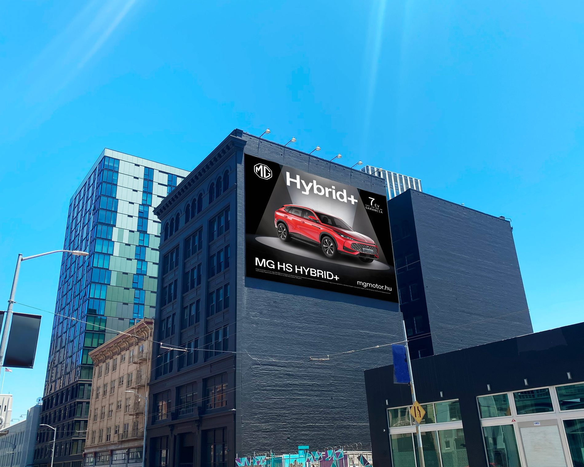 MG HS Hybrid+ building wrap on a city block
